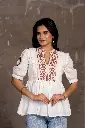 Embroidered White Peplum Cotton Top