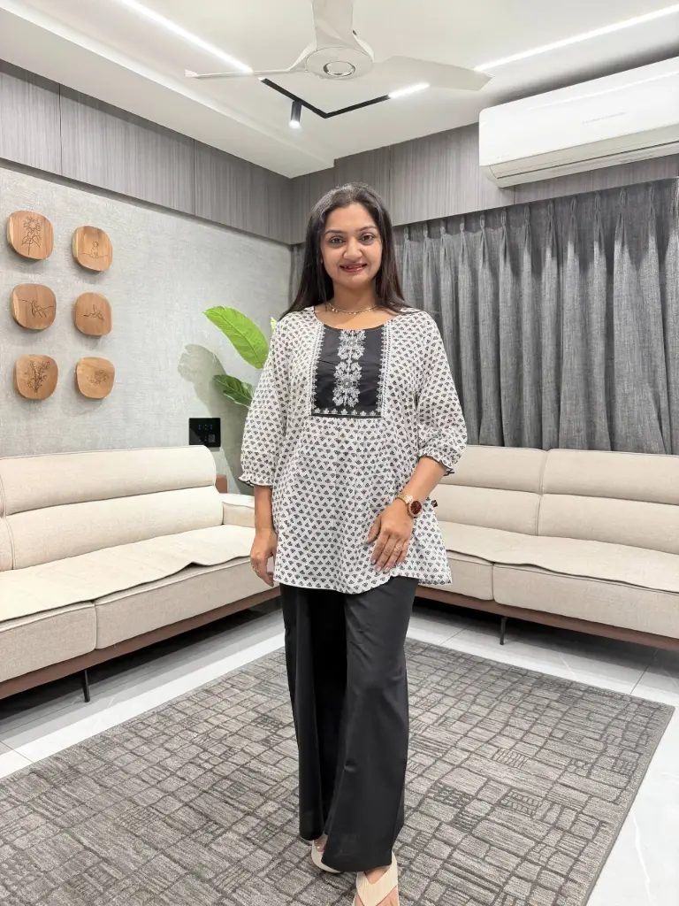 Ebony Lattice Peplum Tunic