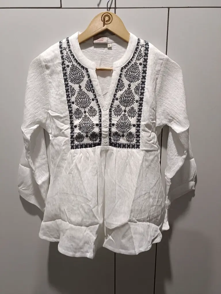 Cloud White Embroidered Peplum Top