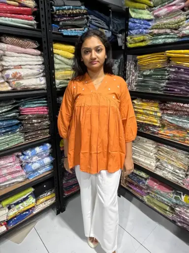 Orange Touch Embroidered Peplum Top